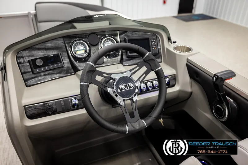 Slide: The Image of 2026 Avalon LSZ QLS boat dashboard with steering wheel and control panel. - 32