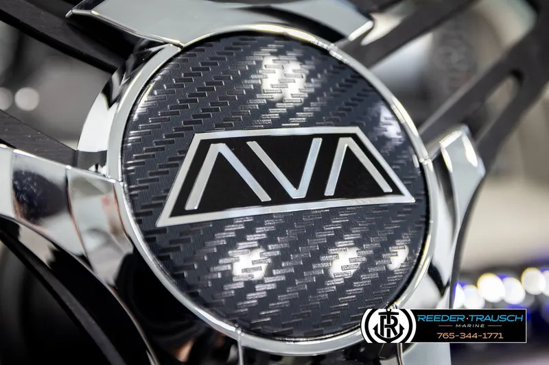 Slide: The Image of Close-up of Avalon LSZ QLS 2026 logo on carbon fiber background. - 33