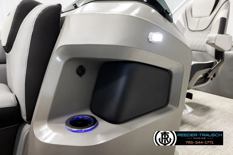 Slide: The Image of 2026 Avalon LSZ QLS boat interior with illuminated cup holder and seating. - 46