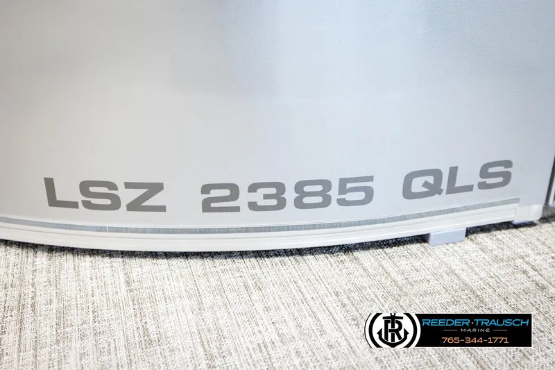 Slide: The Image of 2026 Avalon LSZ QLS boat model detail with Reeder-Trausch Marine branding. - 50