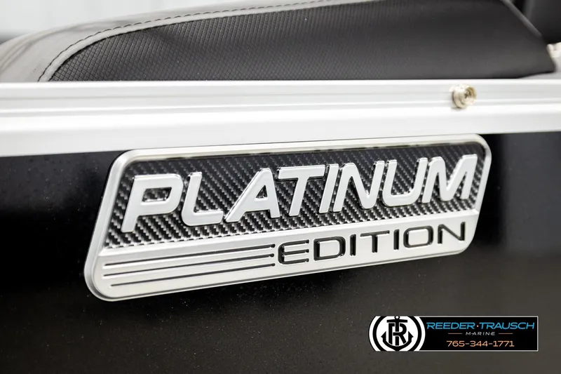 Slide: The Image of 2026 Avalon LSZ QLS Platinum Edition badge with Reeder-Trausch Marine logo. - 51