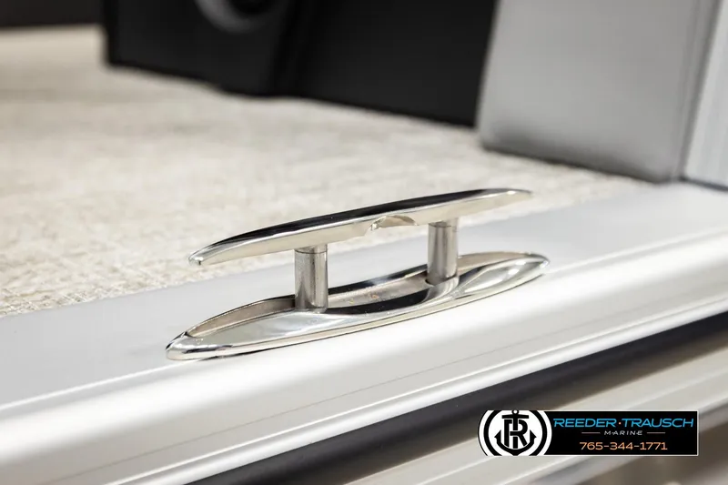 Slide: The Image of Stainless steel cleat on 2026 Avalon LSZ QLS boat deck, Reeder-Trausch Marine logo visible. - 54