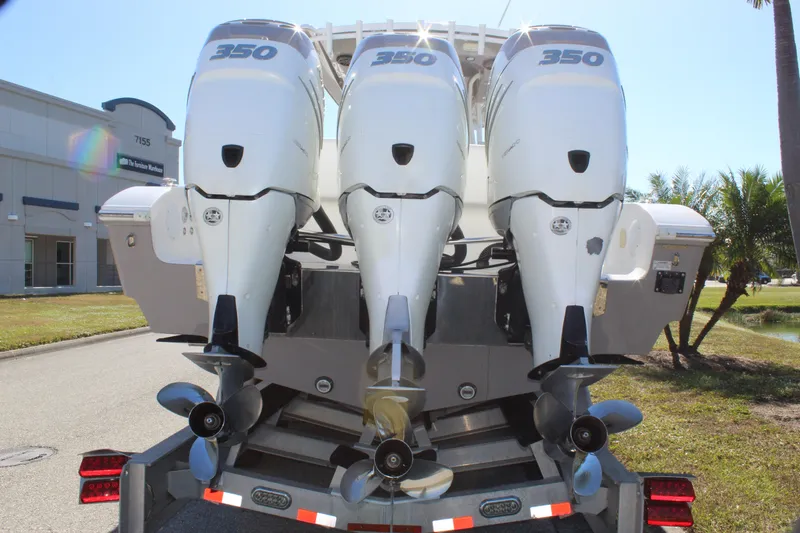 Slide: The Image of 2018 Fountain 38 CC Tournament Edition with triple 350 horsepower engines, rear view. - 34