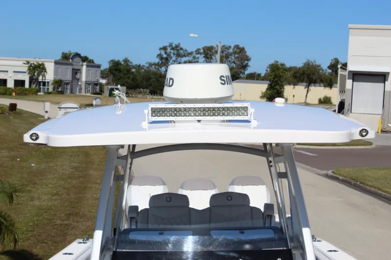 Slide: The Image of 2019 Fountain 38 CC Tournament Edition boat with radar and LED lights on top. - 40