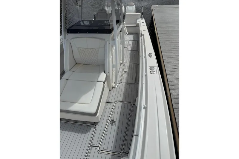 Slide: The Image of 2019 Fountain 38 CC Tournament Edition boat with sleek seating and modern deck design. - 51