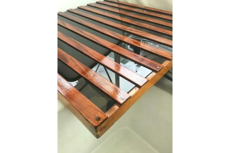 Slide: The Image of Polished wooden slatted surface on a 1977 Ericson 36 C boat. - 20