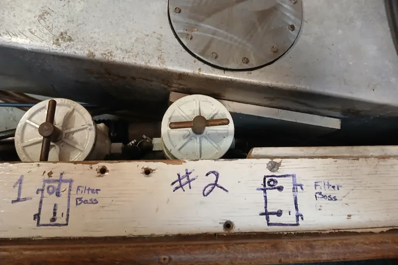 Slide: The Image of Fuel filter system on a 1977 Ericson 36 C sailboat, labeled "Filter Boss." - 44