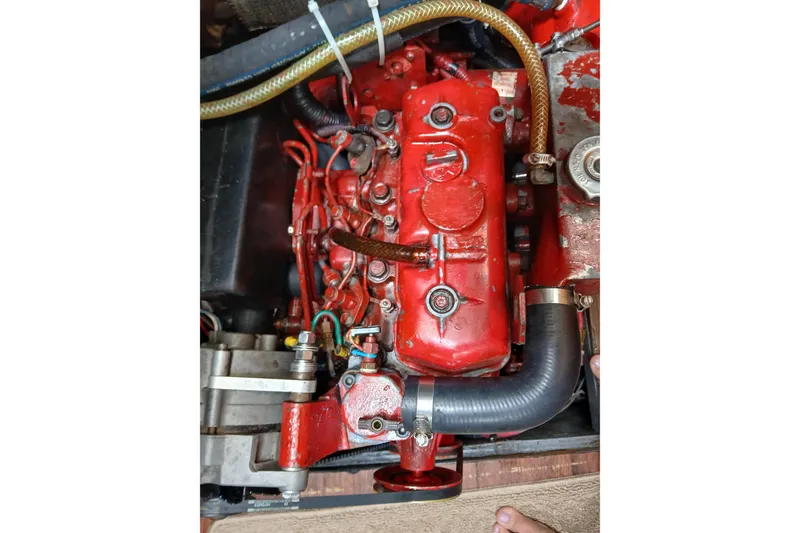 Slide: The Image of Red engine of a 1977 Ericson 36 C sailboat, detailed view. - 47