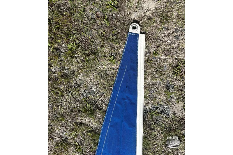 Slide: The Image of Blue sail on grass, Ericson 36 C, 1977 model. - 69