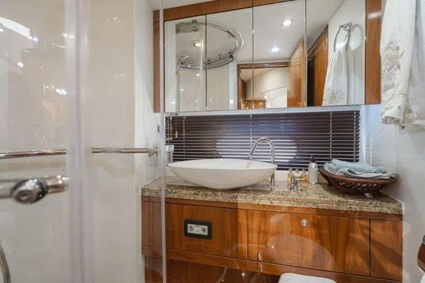 Slide: The Image of Luxurious bathroom in 2010 Sunseeker Manhattan 60 yacht with modern fixtures and elegant design. - 15