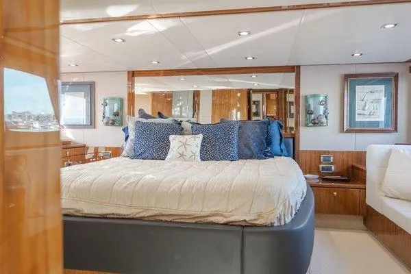 Slide: The Image of Luxurious bedroom interior of 2010 Sunseeker Manhattan 60 yacht with elegant decor. - 23