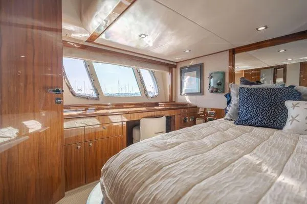 Slide: The Image of Luxurious cabin interior of 2010 Sunseeker Manhattan 60 yacht with elegant wood finish. - 24