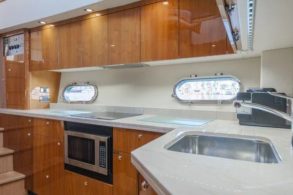 Slide: The Image of Luxurious kitchen interior of 2010 Sunseeker Manhattan 60 yacht with modern amenities. - 27