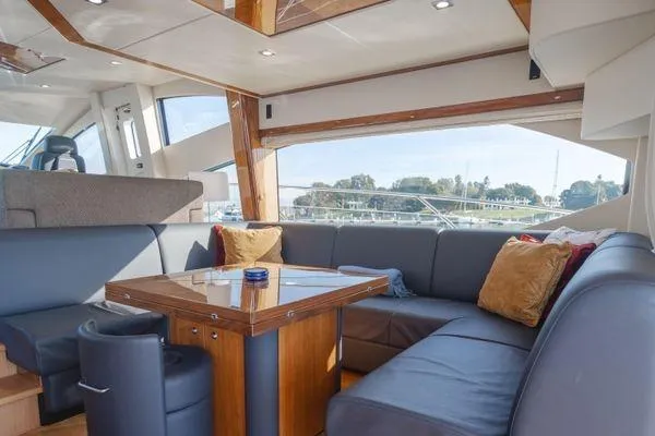 Slide: The Image of Luxurious interior of 2010 Sunseeker Manhattan 60 yacht with elegant seating and table. - 30