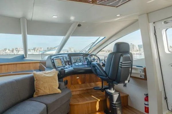 Slide: The Image of Luxurious 2010 Sunseeker Manhattan 60 yacht interior with modern helm and comfortable seating. - 34