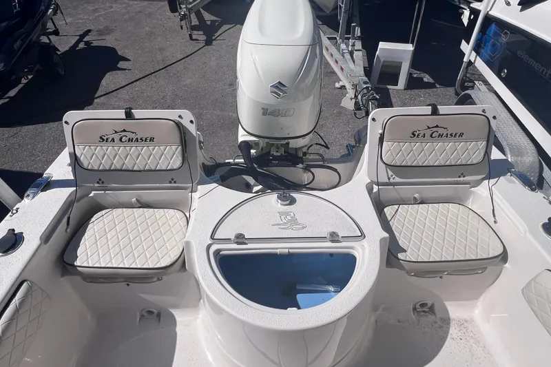 Slide: The Image of 2020 Sea Chaser 21 Sea Skiff boat interior with Suzuki 140 engine. - 10