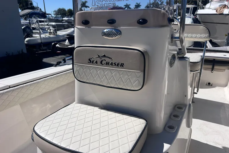 Slide: The Image of 2020 Sea Chaser 21 Sea Skiff boat interior with diamond-stitched seating. - 27
