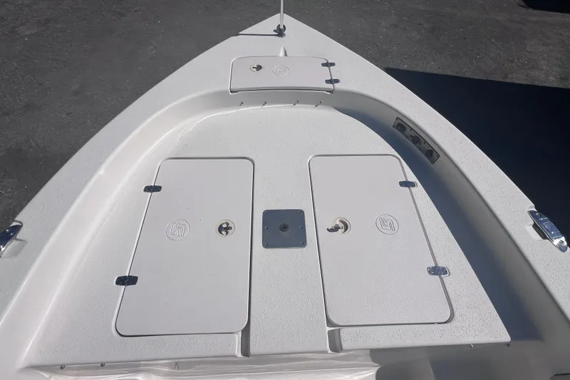 Slide: The Image of 2020 Sea Chaser 21 Sea Skiff boat deck with storage compartments. - 30