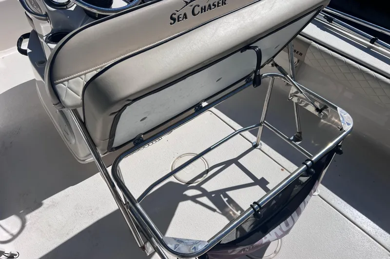 Slide: The Image of 2020 Sea Chaser 21 Sea Skiff boat interior with seating and storage. - 33