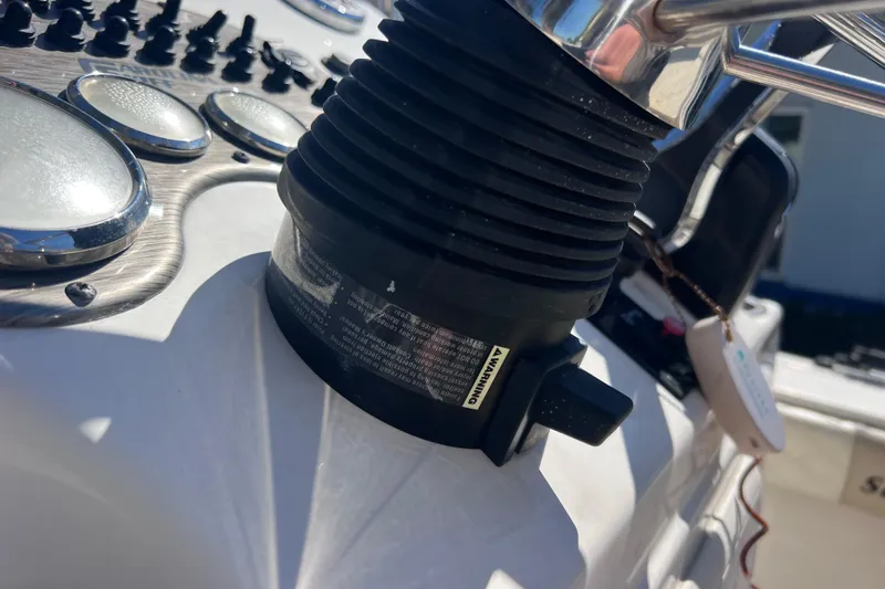 Slide: The Image of Close-up of 2020 Sea Chaser 21 Sea Skiff dashboard controls and steering wheel. - 34