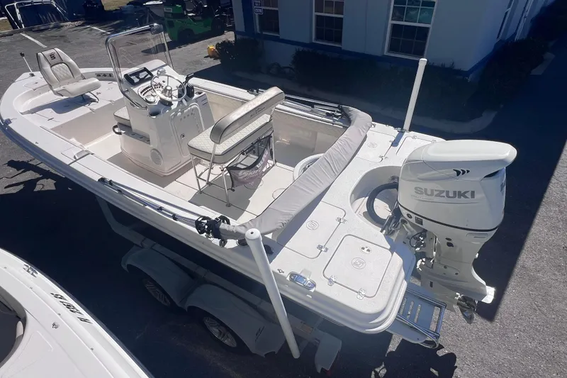 Slide: The Image of 2020 Sea Chaser 21 Sea Skiff boat with Suzuki outboard motor on trailer. - 6