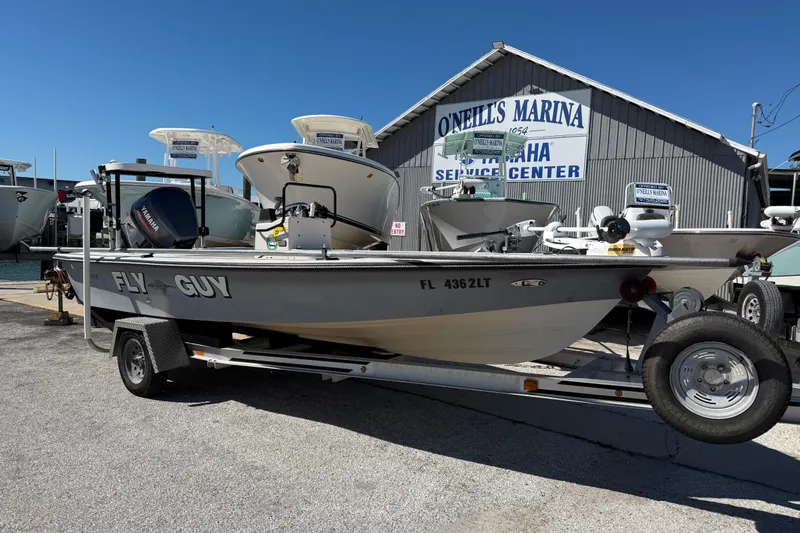 The Image of 2000 Maverick 18 Master Angler boat on trailer at O'Neill's Marina service center. - 1