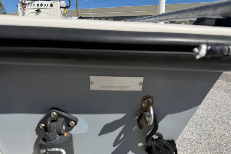 Slide: The Image of 2000 Maverick 18 Master Angler boat detail with hardware and identification plate. - 9