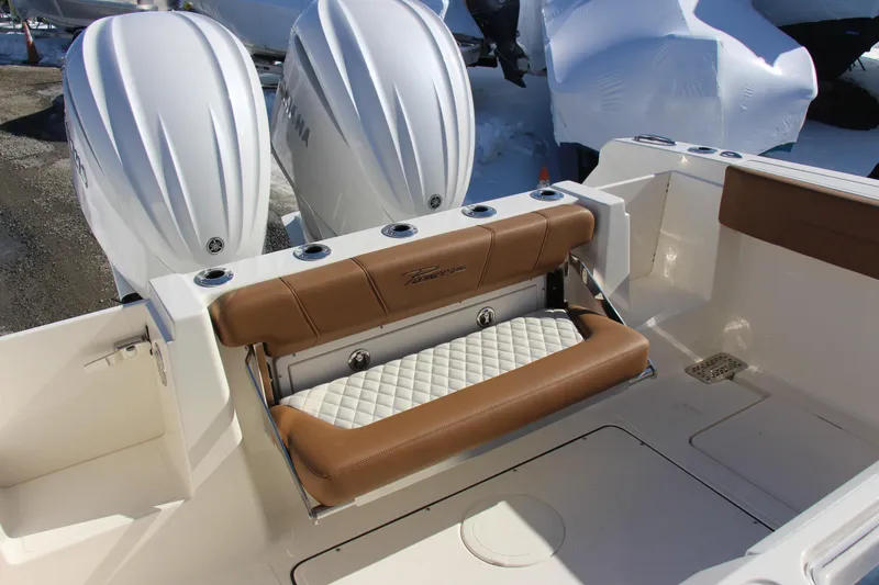 Slide: The Image of 2026 Pioneer 270 Pelagic boat with dual engines and cushioned seating. - 15