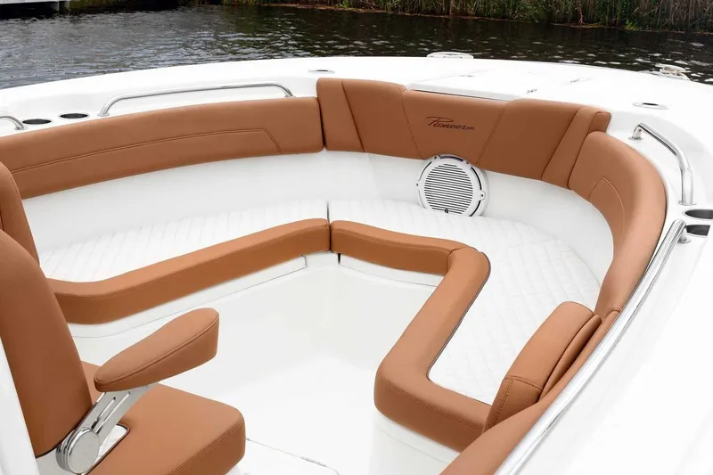 Slide: The Image of Manufacturer Provided Image: Luxurious seating on 2025 Pioneer 270 Pelagic boat, featuring tan cushions and sleek design. - 19