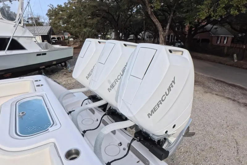 Slide: The Image of 2025 Invincible 39 Open Fisherman with triple Mercury outboard engines. - 6