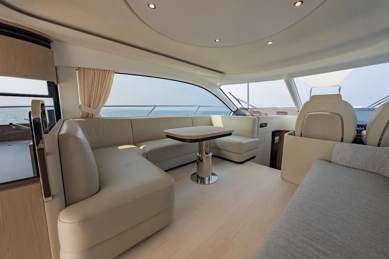 Slide: The Image of Luxurious interior of 2023 Azimut Fly 53 yacht with elegant seating and ocean view. - 22