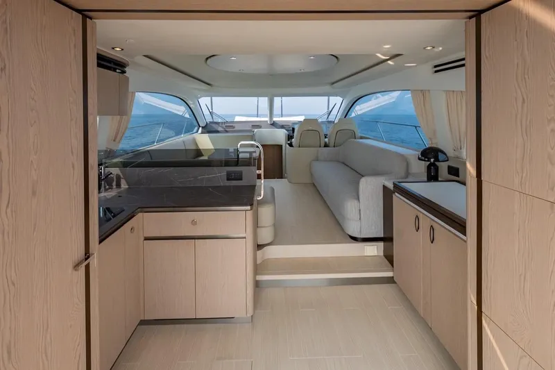 Slide: The Image of Luxurious interior of 2023 Azimut Fly 53 yacht with modern design and panoramic windows. - 24