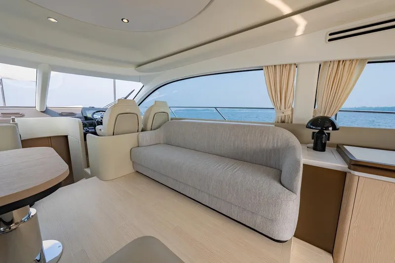 Slide: The Image of Luxurious interior of 2023 Azimut Fly 53 yacht with modern seating and ocean view. - 28