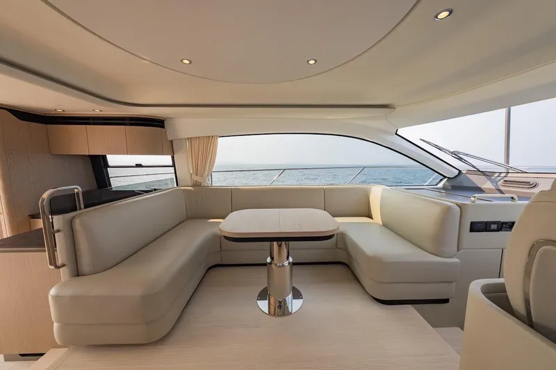 Slide: The Image of Luxurious interior of 2023 Azimut Fly 53 yacht with elegant seating and ocean view. - 30