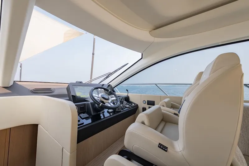 Slide: The Image of Luxurious interior of 2023 Azimut Fly 53 yacht with modern helm and leather seating. - 31