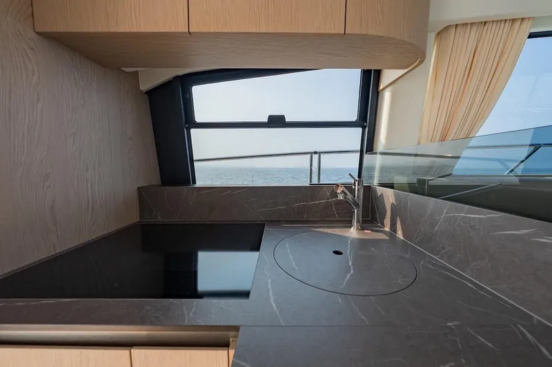 Slide: The Image of Modern kitchen interior on 2023 Azimut Fly 53 yacht with ocean view. - 39