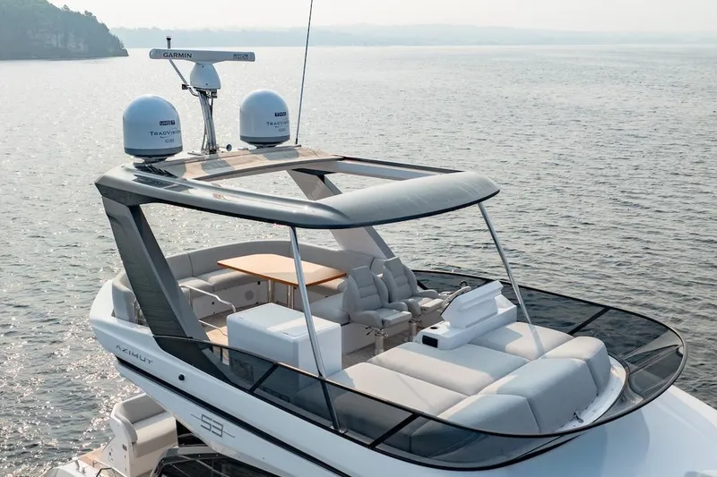 Slide: The Image of 2023 Azimut Fly 53 yacht with sleek design and luxurious seating on open water. - 6