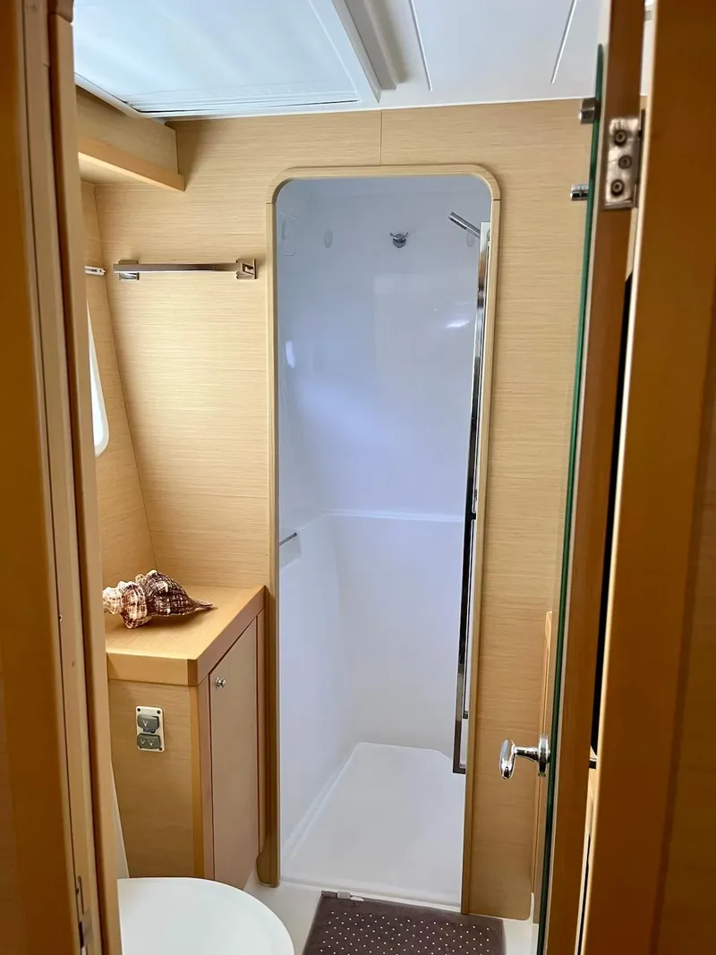 Slide: The Image of Interior of a 2017 Lagoon 39 yacht bathroom with modern fixtures and wooden accents. - 41
