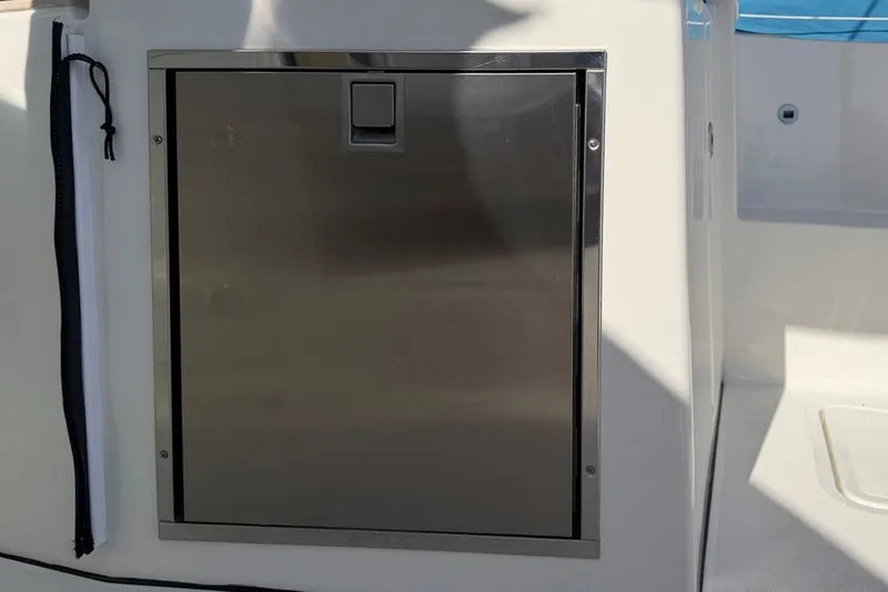 Slide: The Image of Stainless steel door on Pursuit DC 326 Dual Console boat, 2021 model. - 20