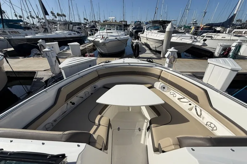 Slide: The Image of Pursuit DC 326 Dual Console 2021 docked at marina. - 41