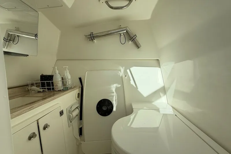 Slide: The Image of Interior of Pursuit DC 326 Dual Console 2021, bathroom view. - 44