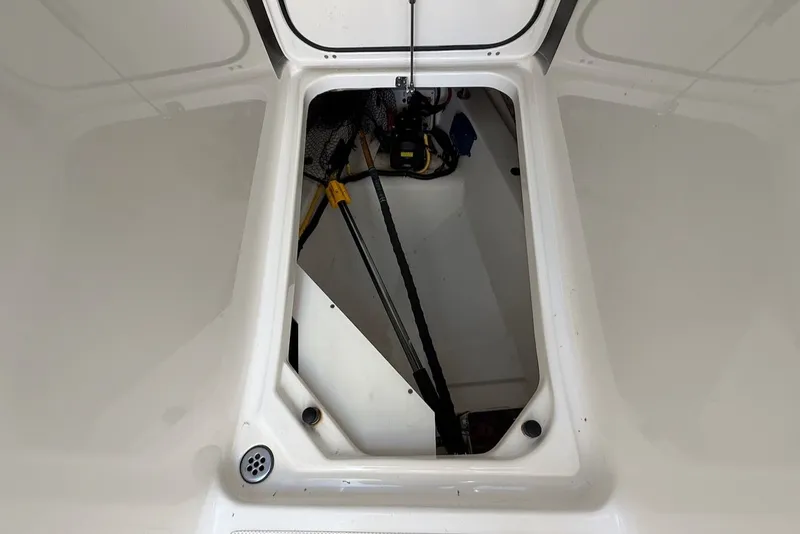 Slide: The Image of Storage compartment in Pursuit DC 326 Dual Console boat, 2021 model. - 48