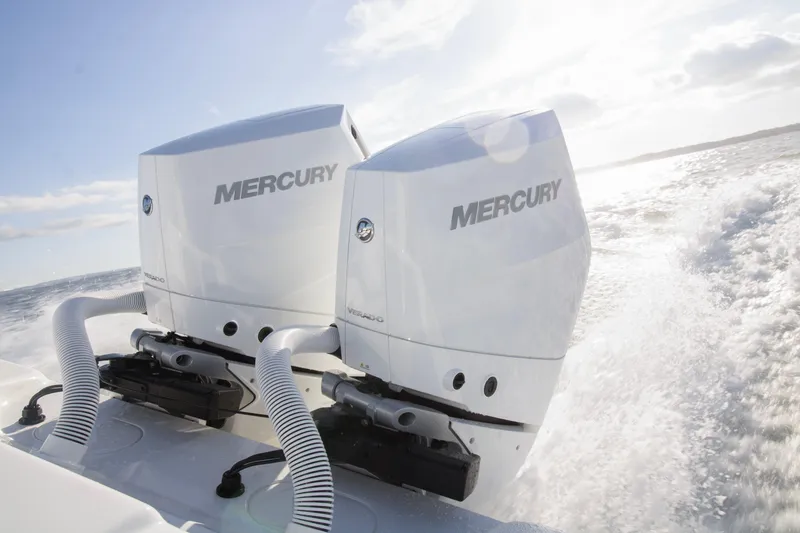 Slide: The Image of Twin Mercury outboard engines on 2025 Yellowfin 32 Offshore boat in action. - 27