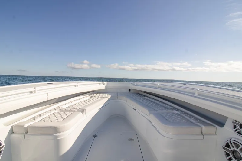 Slide: The Image of 2025 Yellowfin 32 Offshore boat interior with ocean view and clear sky. - 9