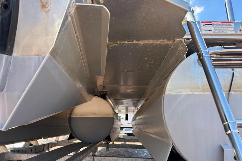 Slide: The Image of Underneath view of 2023 Cypress Cay Seabreeze 232 pontoon boat, showcasing aluminum structure. - 24