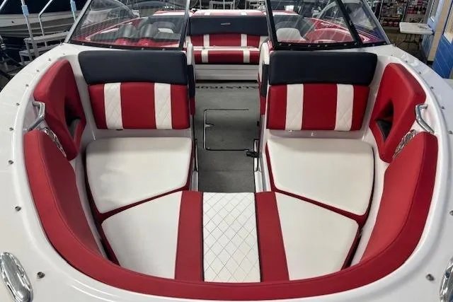 Slide: The Image of 2014 Glastron GTS 225 boat interior with red and white seating, sleek design. - 3