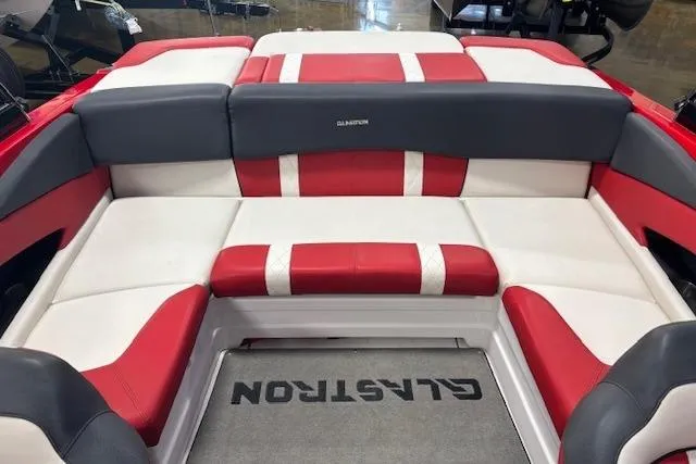 Slide: The Image of 2014 Glastron GTS 225 boat interior with red and white seating. - 4