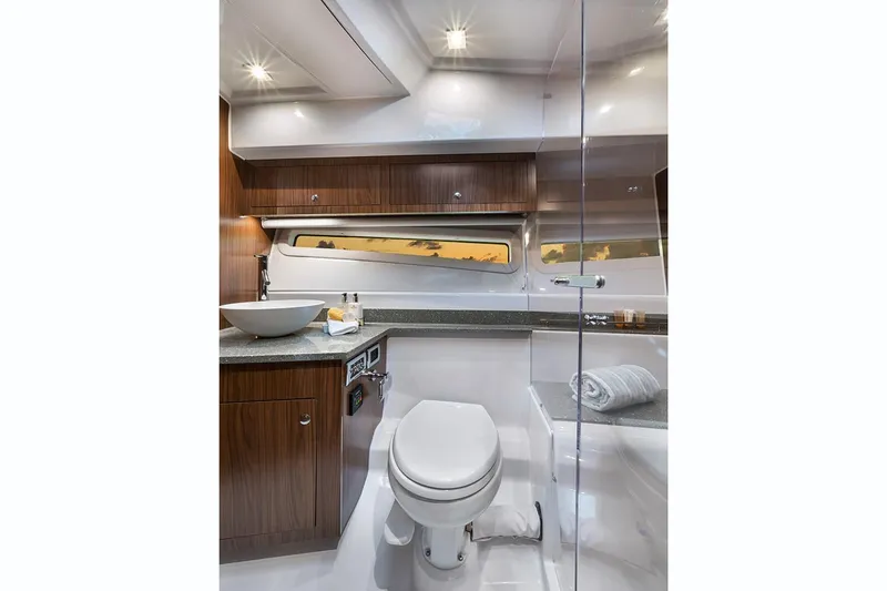 Slide: The Image of Manufacturer Provided Image: Luxurious bathroom in 2020 Four Winns Vista 355 Coupe OB boat with modern fixtures. - 47