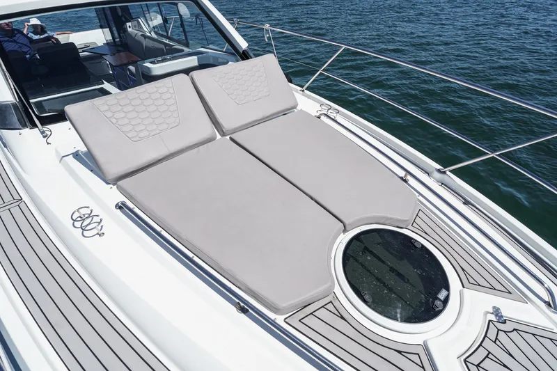 Slide: The Image of 2020 Four Winns Vista 355 Coupe OB with sunbathing deck on open water. - 54