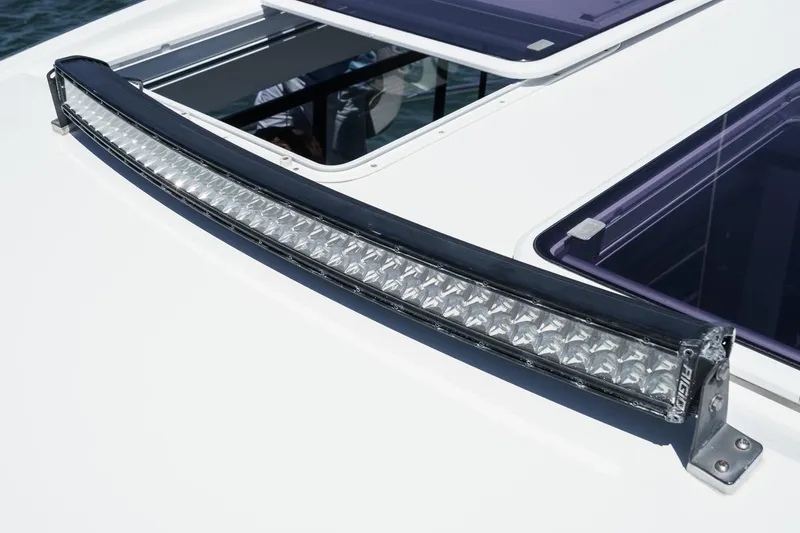 Slide: The Image of LED light bar on 2020 Four Winns Vista 355 Coupe OB boat roof. - 58